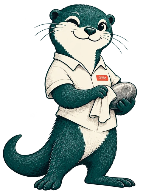 Ollie, our otter mascot, carefully polishing his stone
