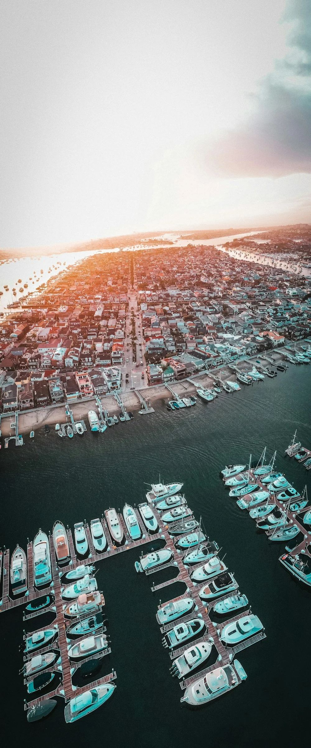 Boats and waterfront homes in Newport Beach harbor