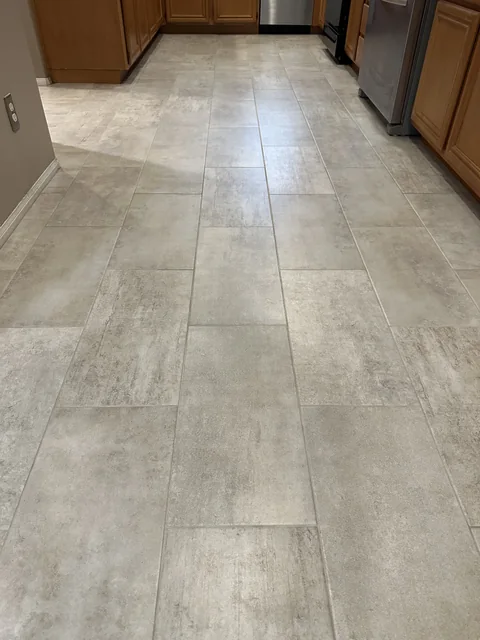 Rectangular kitchen tile and grout after cleaning: The same tile layout with lighter-looking joints and a more consistent appearance.